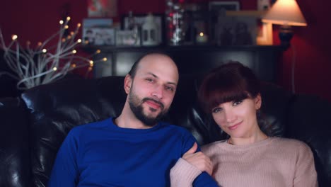 4k-Authentic-Shot-of-a-Couple-Sitting-on-Couch