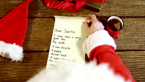 Santa-claus-reading-a-letter