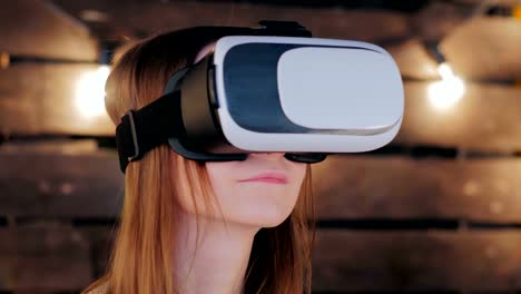 Young-woman-using-Virtual-Reality-Glasses