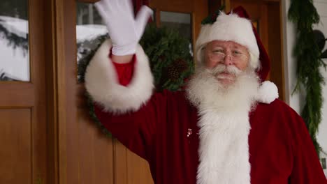 Santa-Claus-waving-by-front-door