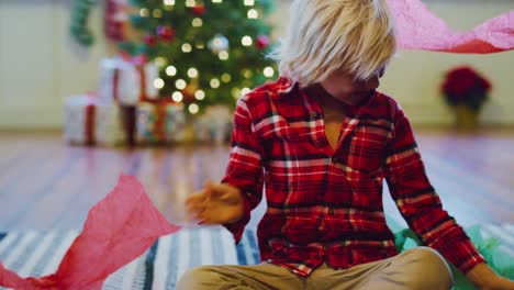 Young-Boy-Opening-Christmas-Presents