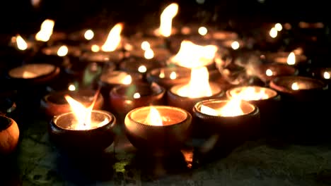 Defocused,-slow-motion-candlelight-bokeh-and-blur-candles-background