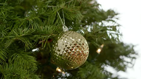 Close-up-of-a-girl-giving-her-family-their-Christmas-presents