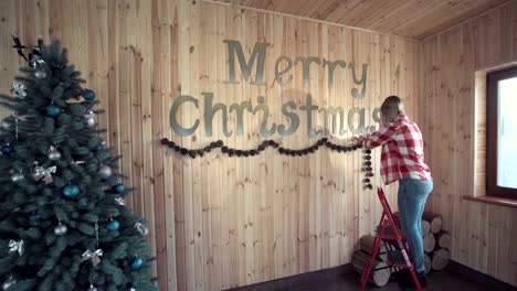 Woman-doing-decor-for-Christmas