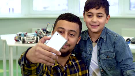 Father-and-son-make-selfie