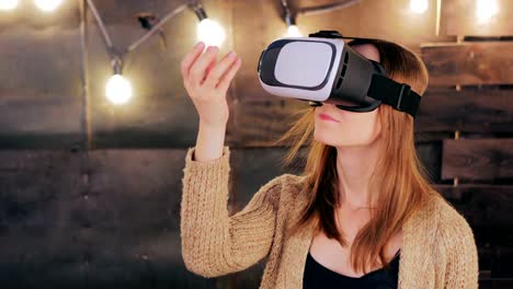 Young-woman-using-Virtual-Reality-Glasses