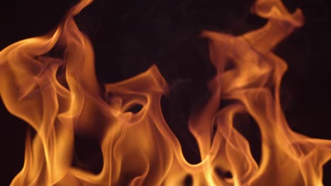 Closeup-of-fire-burning-on-black-background-in-slow-motion