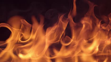 Closeup-of-fire-burning-on-black-background-in-slow-motion