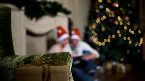 Young-couple-shopping-online-with-tablet-PC.-Blurred-faces