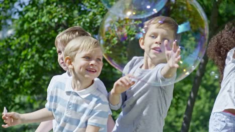 Lovely-Children-Bursting-Large-Soap-Bubbles