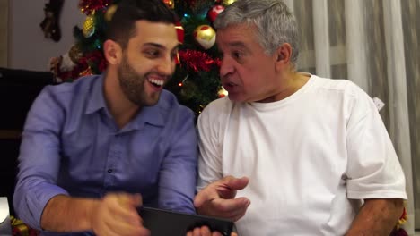 Father-and-Son-Having-a-Video-Chat-on-Christmas-Day