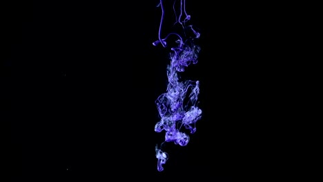 Abstract-colorful-purple-ink-in-water-on-black-background.-Dropping-ink-in-water,