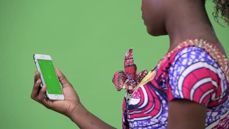 Young-African-woman-using-phone