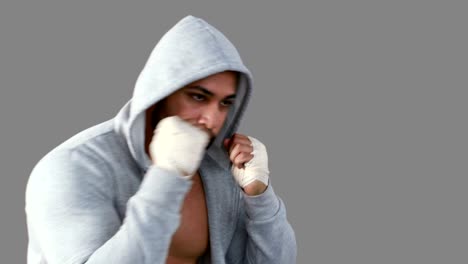 Muscular-man-wearing-grey-hood