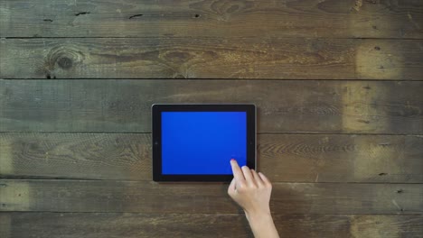 Swipes-Up-Hand-Digital-Tablet-with-Blue-Screen