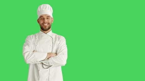 Mid-Shot-of-a-Handsome-Chef-making-Presenting-Gesture.-Background-is-Green-Screen.