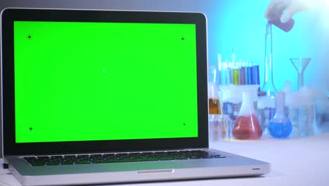 Laptop-with-a-Green-Screen-in-the-Laboratory