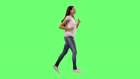 Fit-Young-Girls-Wearing-Casual-Clothes-Running-on-a-Mock-up-Green-Screen.