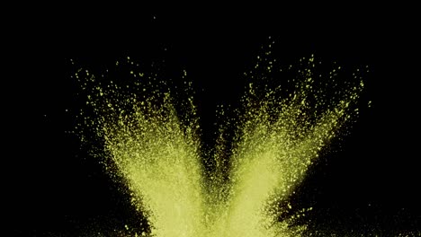 Yellow-powder-exploding-on-black-background-in-super-slow-motion