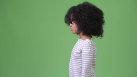 Profile-view-of-young-cute-African-girl-with-Afro-hair