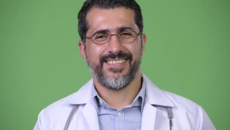 Handsome-happy-Persian-bearded-man-doctor-smiling