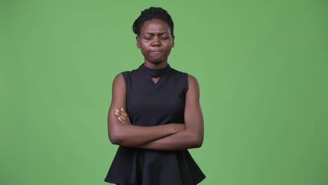 Young-angry-African-businesswoman-with-arms-crossed