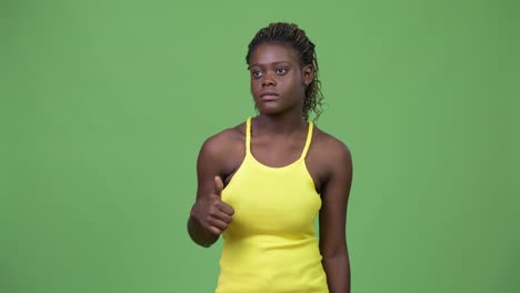 Young-African-woman-giving-thumbs-up