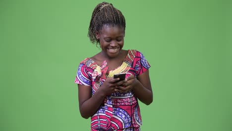 Young-African-woman-using-phone