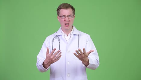 Angry-Man-Doctor-Talking-And-Screaming-In-Rage