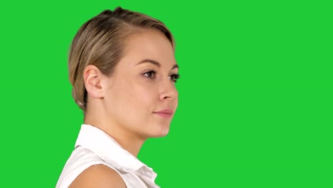 Stunning-walking-woman-close-up-of-her-face-on-a-Green-Screen,-Chroma-Key