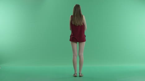 beautiful-girl-waiting-for-someone-on-a-green-screen