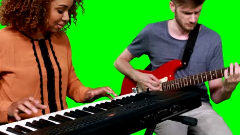 Musicians-playing-piano-and-guitar