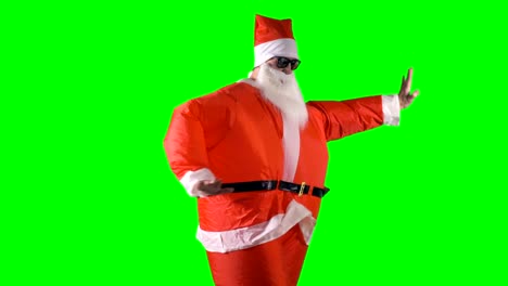 Santa-Claus-makes-dancing-moves-with-arms-and-legs-on-a-green-background.