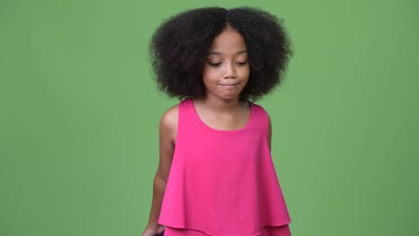 Young-cute-African-girl-with-Afro-hair-exercising-with-dumbbells