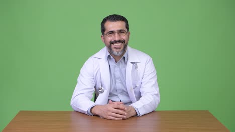 Handsome-Persian-bearded-man-doctor-smiling