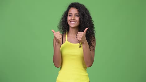 Young-beautiful-Hispanic-woman-giving-thumbs-up