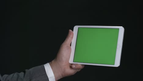 Male-Hands-Using-Tablet-with-Futuristic-Technology