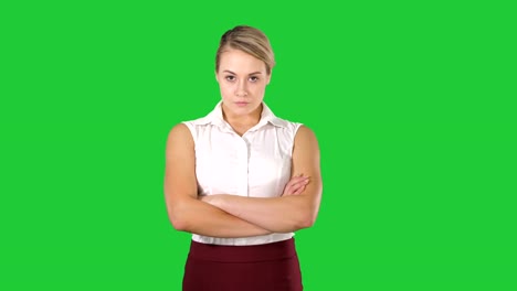 Smiling-business-woman-with-folded-hands-on-a-Green-Screen,-Chroma-Key