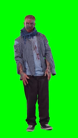 Scary-zombie-in-halloween-isolated-green-background