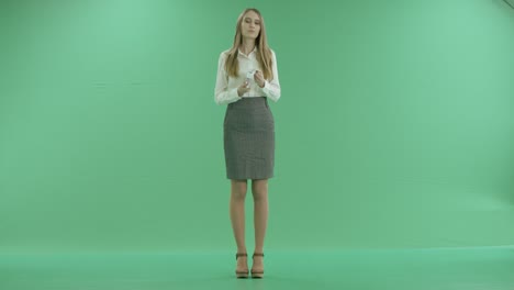 Business-woman-counts-money-on-green-screen