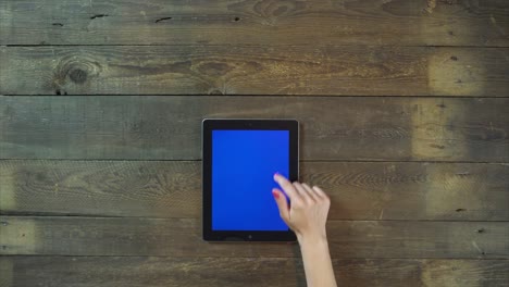 Swipes-Up-Hand-Digital-Tablet-with-Blue-Screen