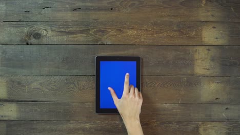 Zoom-Out-Hand-Digital-Tablet-with-Blue-Screen