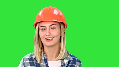 Construction-worker-talking-to-camera-on-a-Green-Screen,-Chroma-Key