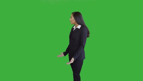 Lifestyle-Portrait-of-Young-African-American-Business-Woman-Isolated-on-Green-Screen-Chroma-key-Background