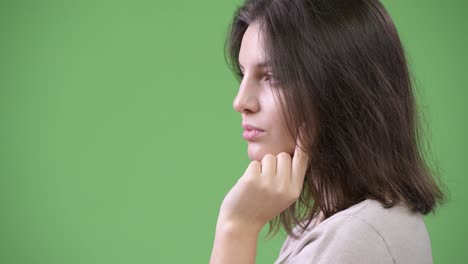 Profile-view-of-young-beautiful-woman-thinking