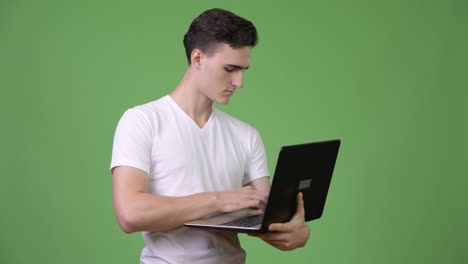 Young-handsome-man-using-laptop