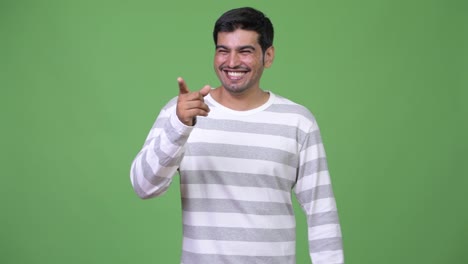 Young-handsome-Persian-man-laughing