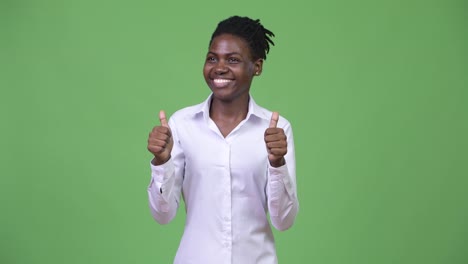 Young-beautiful-African-businesswoman-giving-thumbs-up