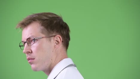 Back-View-Of-Young-Man-Doctor-Turning