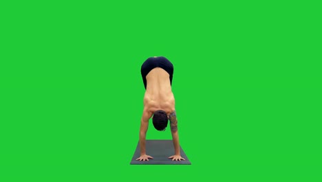 Yoga-master-working-out-doing-yoga-exercise-downward-facing-dog-pose,-adho-mukha-svanasana-(surya,-namaskar-pose)-on-a-Green-Screen,-Chroma-Key